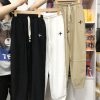 Quần jogger nữ vải đũi xước thêu logo nhiều size - QG421
