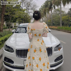 Đầm hoa xốp vàng xoắn ngực - VD5814