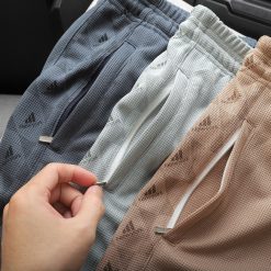 Set Bộ Nam Quần Short Áo Tay Ngắn In Logo Chìm Cao Cấp - SBN055