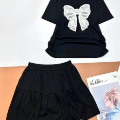 Đồ bộ gân tăm quần váy áo in nơ lớn - DBO4899